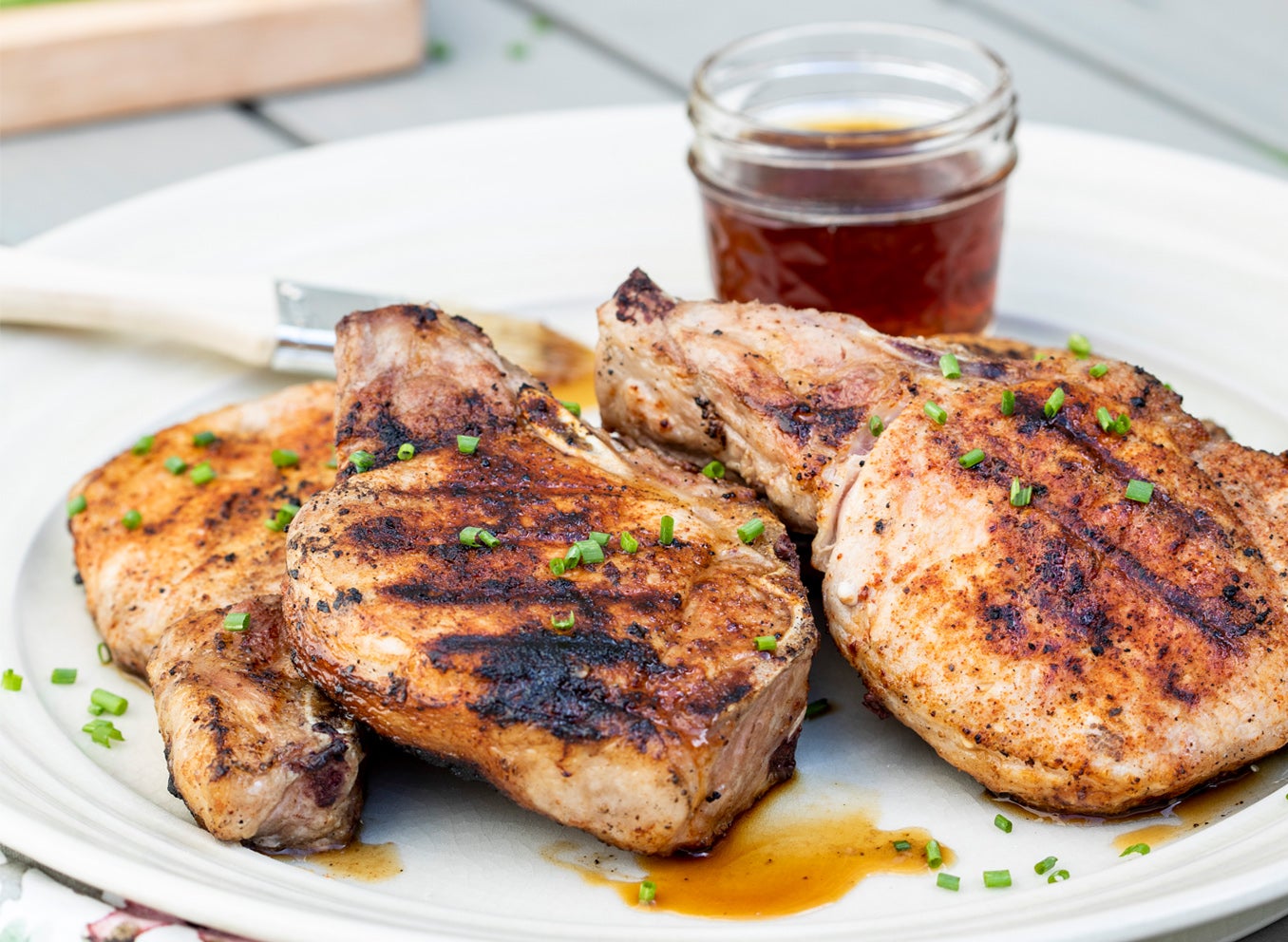 Grilled Bone-in Smoky Maple Glazed Pork Chops | Kingsford®