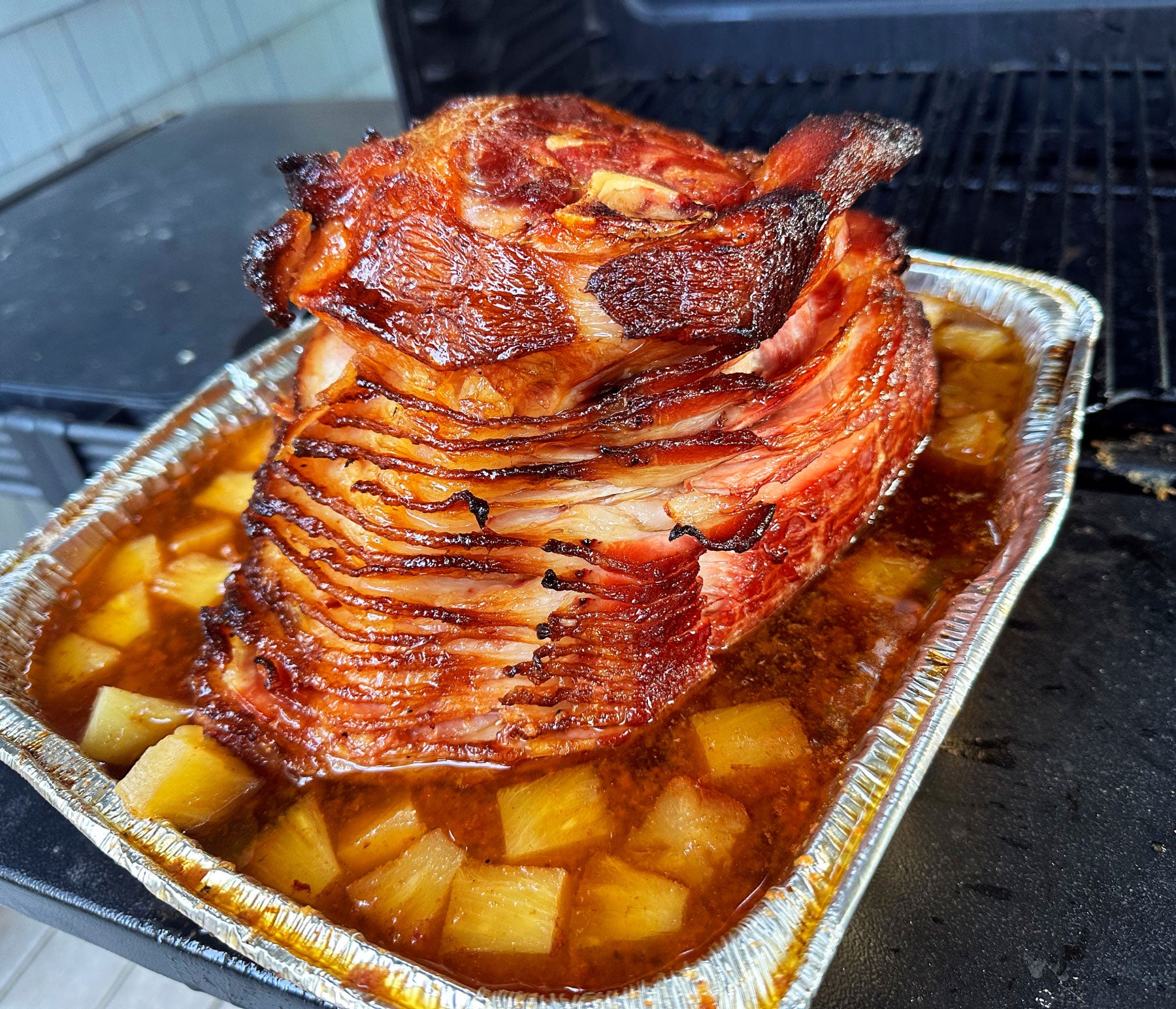 Holiday Baked Ham with Charred Pineapple Bourbon Glaze